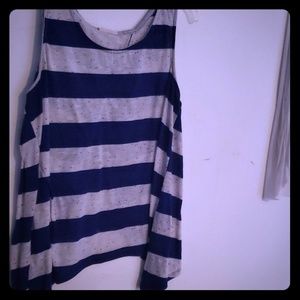 White, blue, and polka dot colored shirt